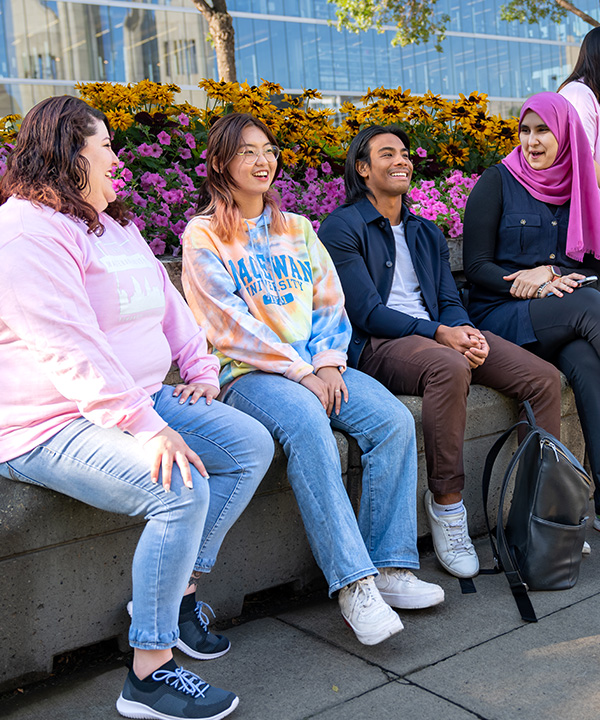 students sitting outdoors