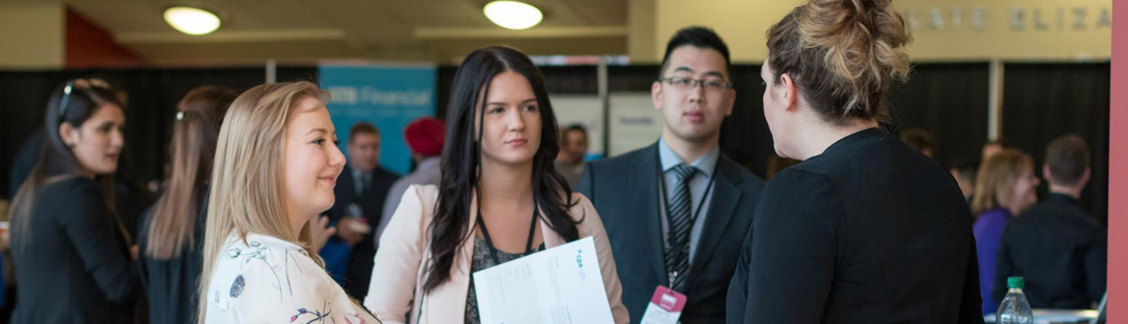 students talking on campus