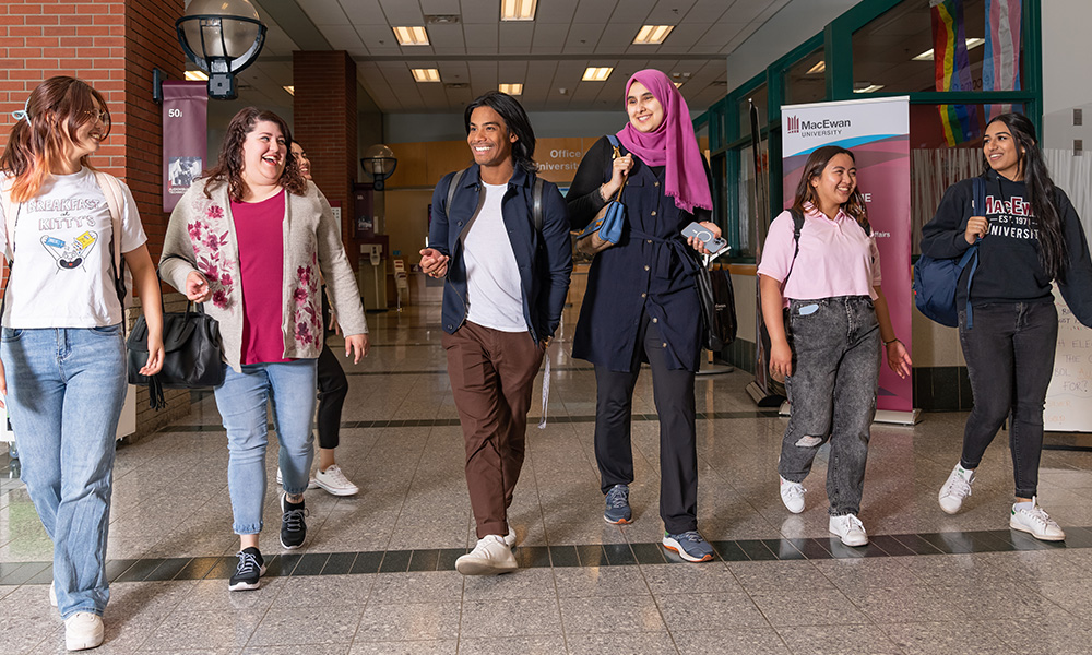 students walking down hallway