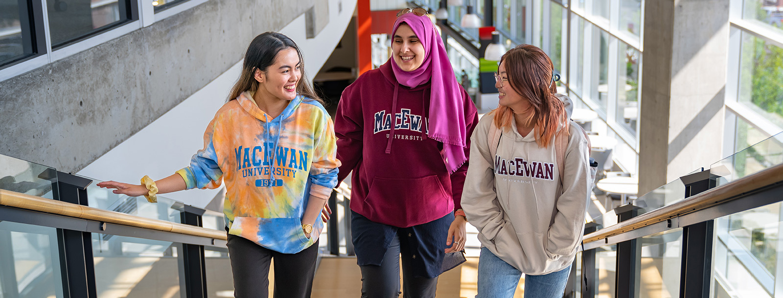 students walking up staircase