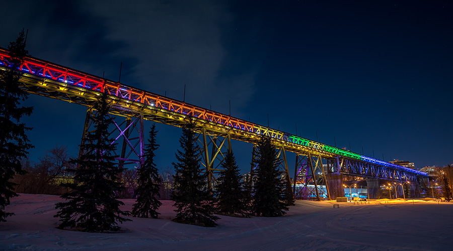 bridge lite up with pride colors