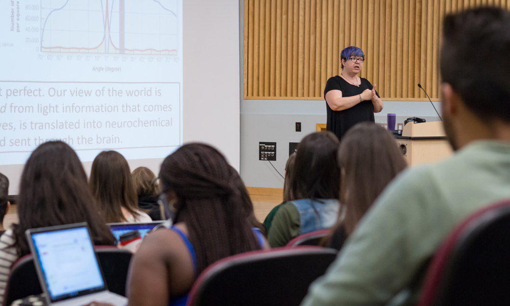 Dr. Lynne Honey giving lecture to students