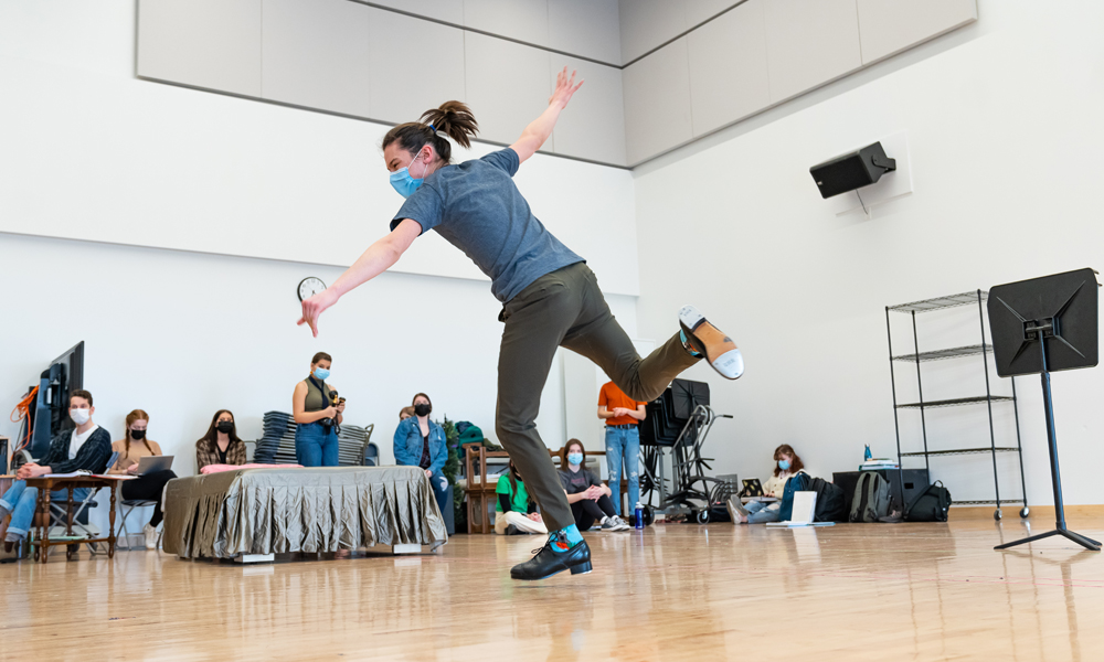 Theatre students jumps into the air