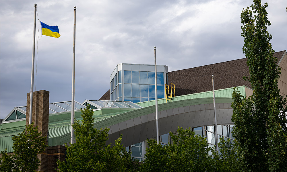 Ukrainian flag flying outside of Building 6