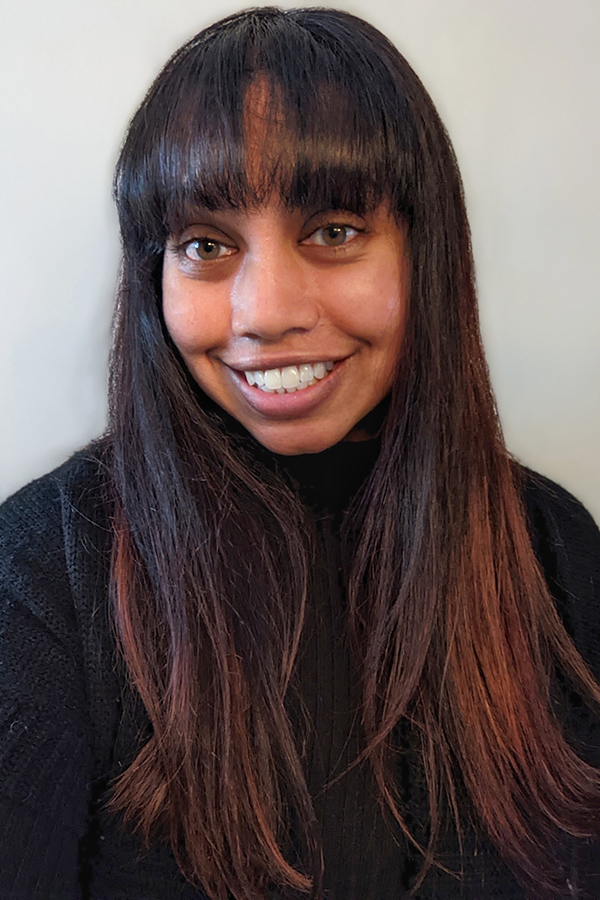 Headshot of Tisha Raj against a white background.