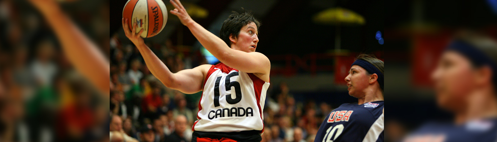 Danielle Peers in action on the court preparing to pass or shoot the ball