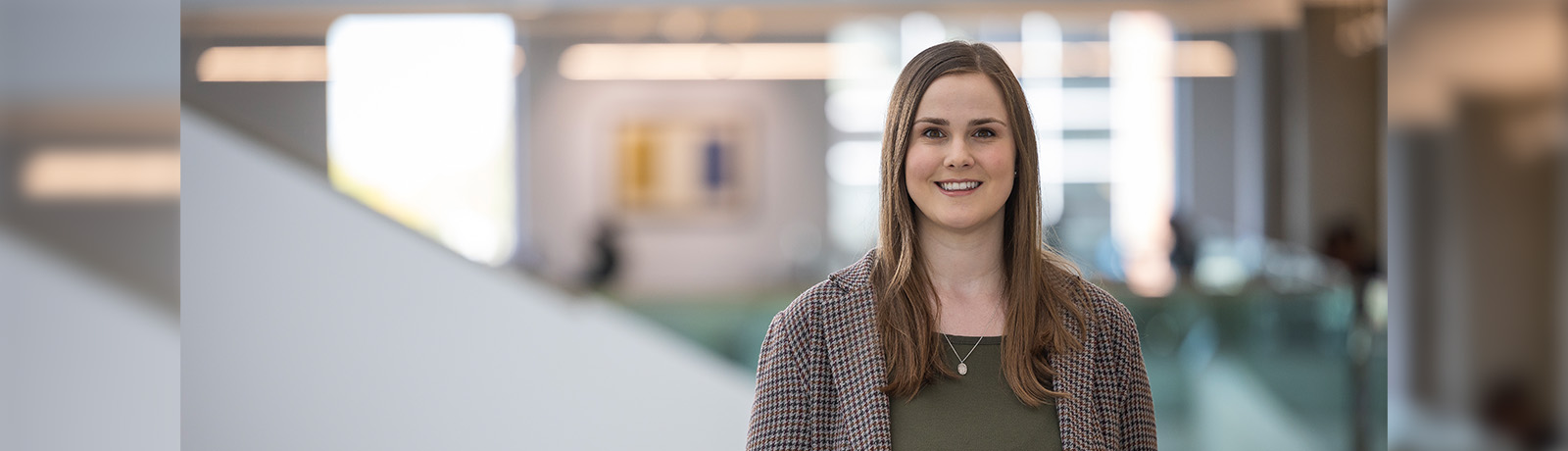 Alicia Slusarchuk stands in Allard Hall