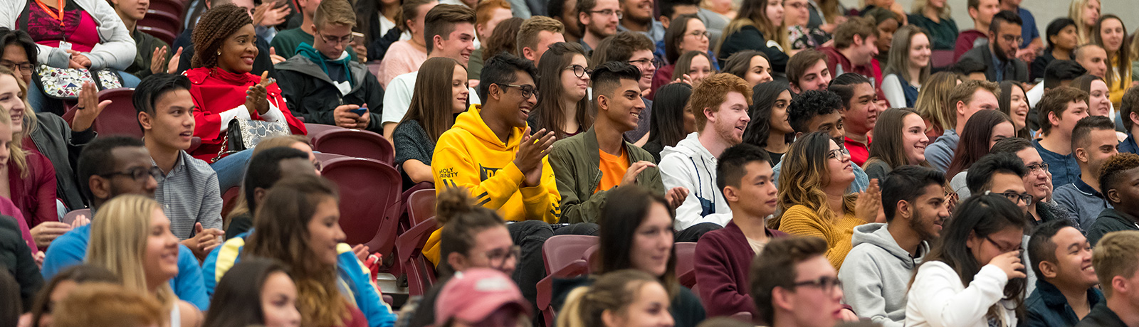 students at new student orientation assembly