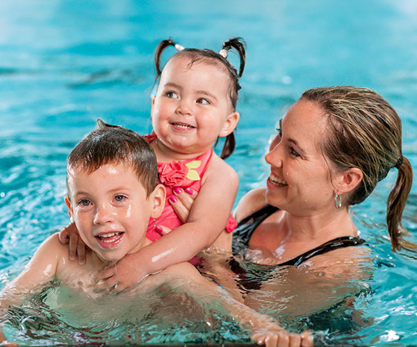 family in swimming pool