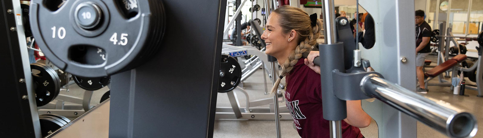 female student weightlifting