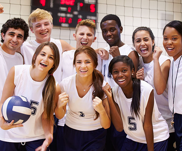 students smiling in gym