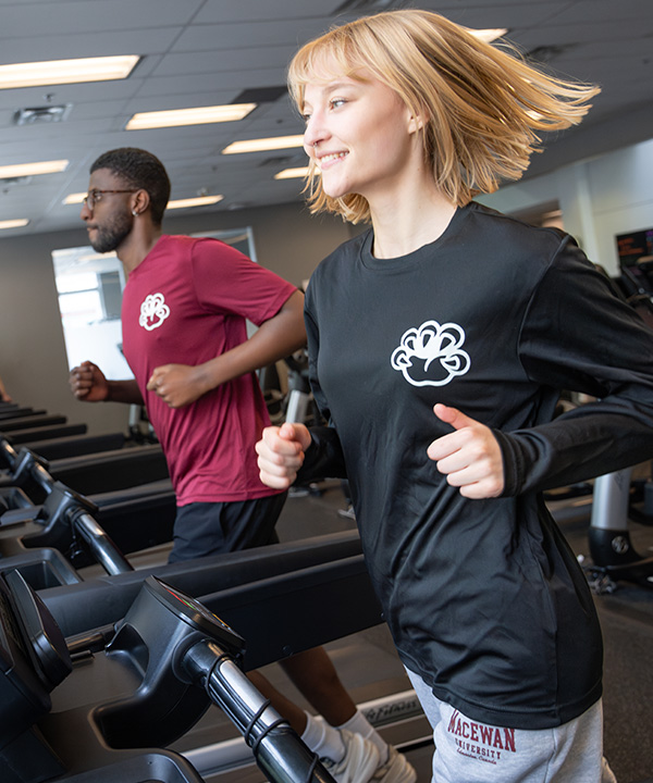 students running on treadmills