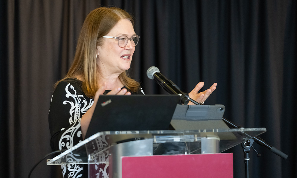 Dr. Jane Philpott speaks at a podium