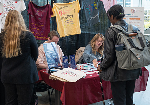 students at booth