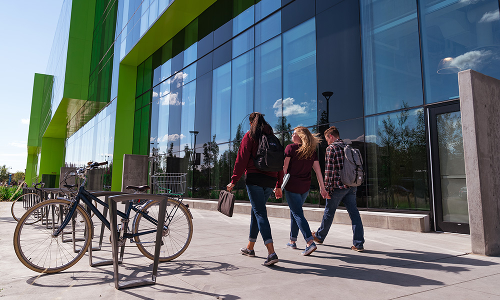 students walking outside allard hall